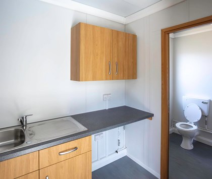 Kitchenette with entrance to Toilet