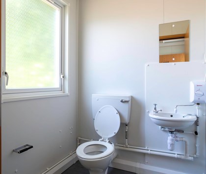 Toilet in Unit