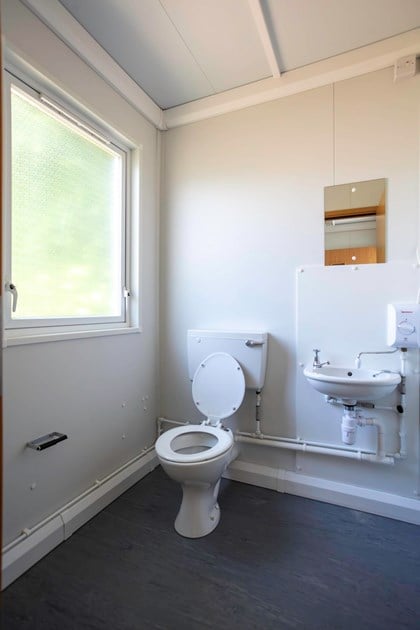 Toilet in Unit