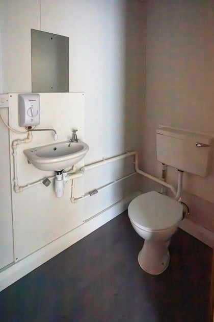 Toilet inside unit